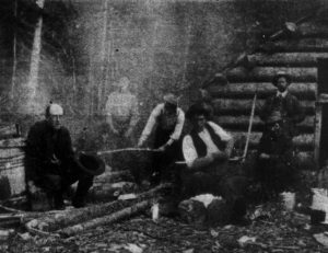 Frederick Irland's photograph. The man he called "The Lost Man," and who I believe is the Dungarvon Whooper is sitting  on the left. (Forest & Stream)