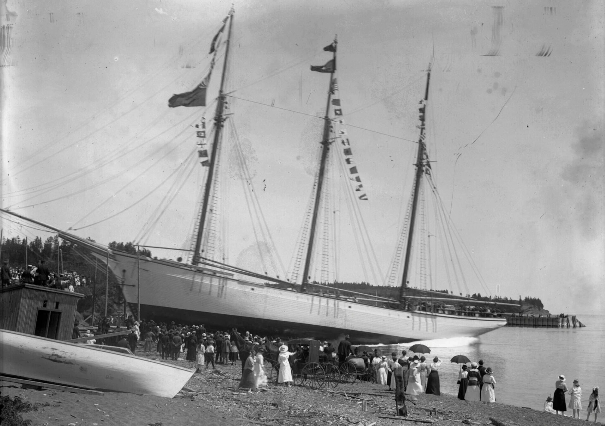Here we see a group of people in St. Martins dressed up in their finest to launch a ship. This photo was probably taken about a decade after the mysterious events where a similar ship, the Union, inexplicably flipped over, shortly before a crew member claimed he’d been warned to flee the ship. (Provincial Archives of New Brunswick P210\3022)